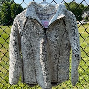 Brown/cream colored sherpa in size small.